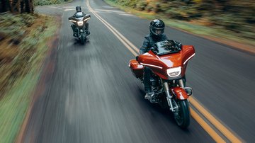motorcycles riding on road